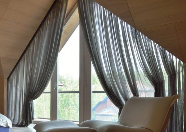 Индивидуальный пошив штор на нестандартные окна: ткани, стиль и элегантность